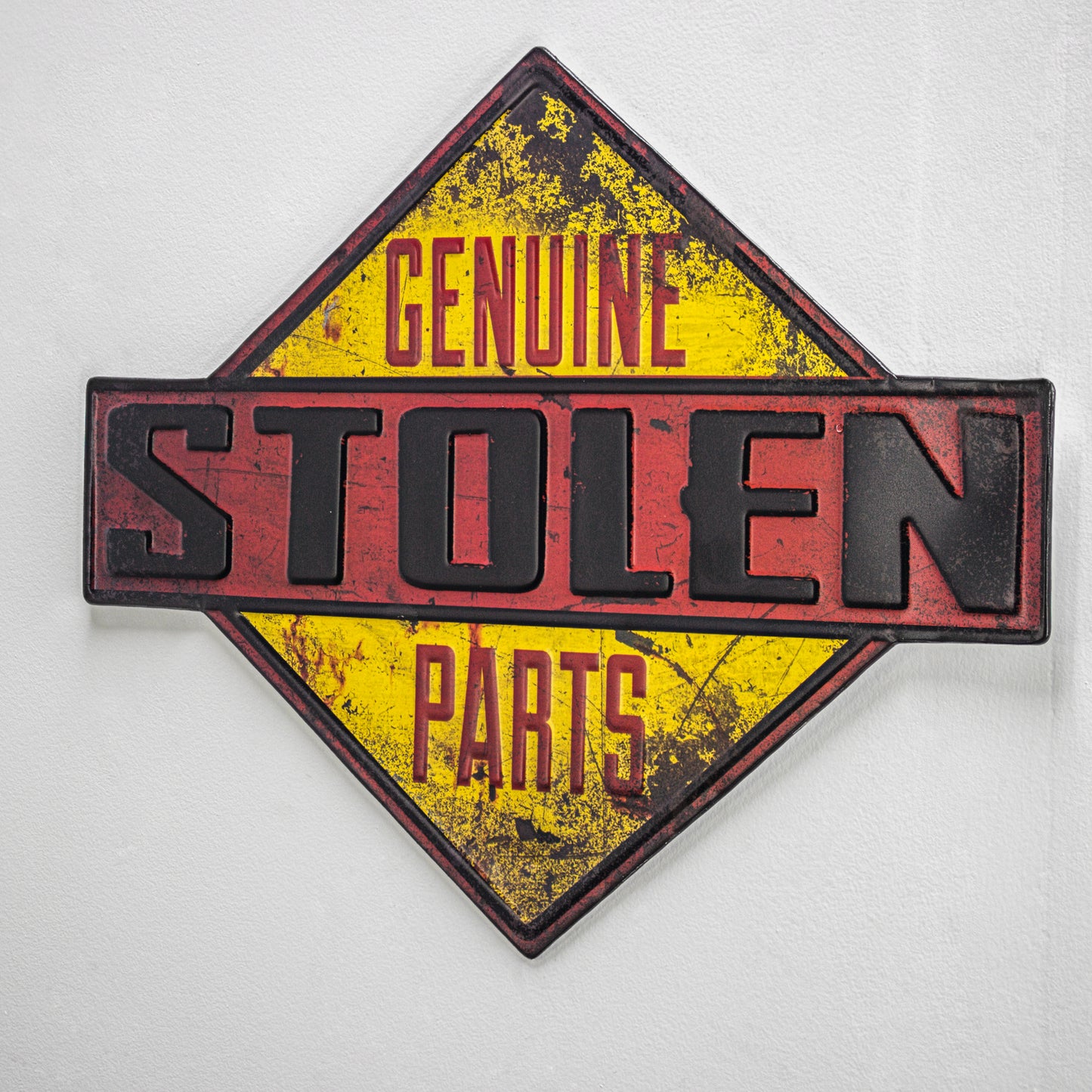 Genuine Stole Parts Embossed Metal Sign