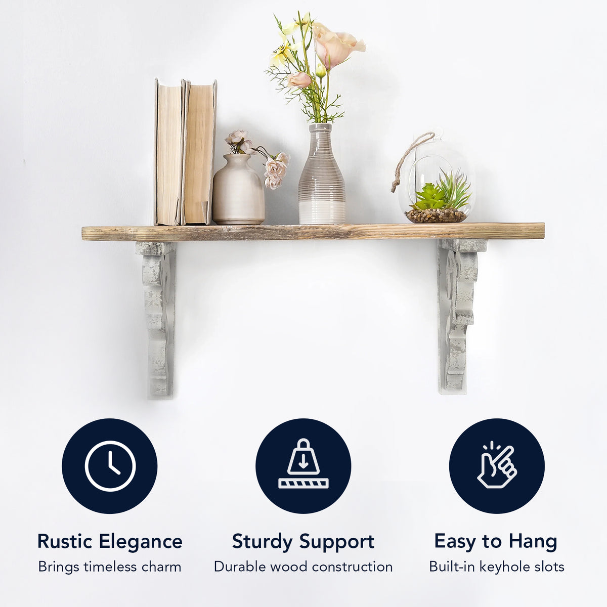 Set of two 12-inch washed white wood corbels with distressed floral scrollwork and dual keyhole slots, styled as farmhouse shelf brackets and architectural wall accents.