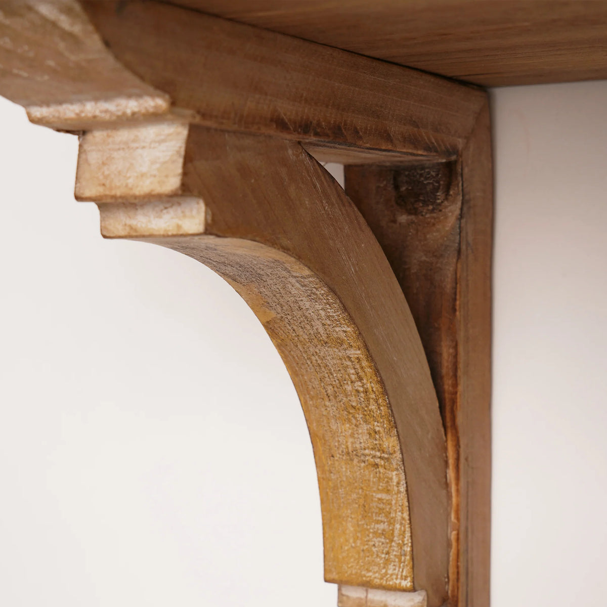 Set of two natural wood decorative corbels with carved vintage curves, shown as farmhouse shelf brackets and architectural accents for shelves, doorways, bookends and candle displays.