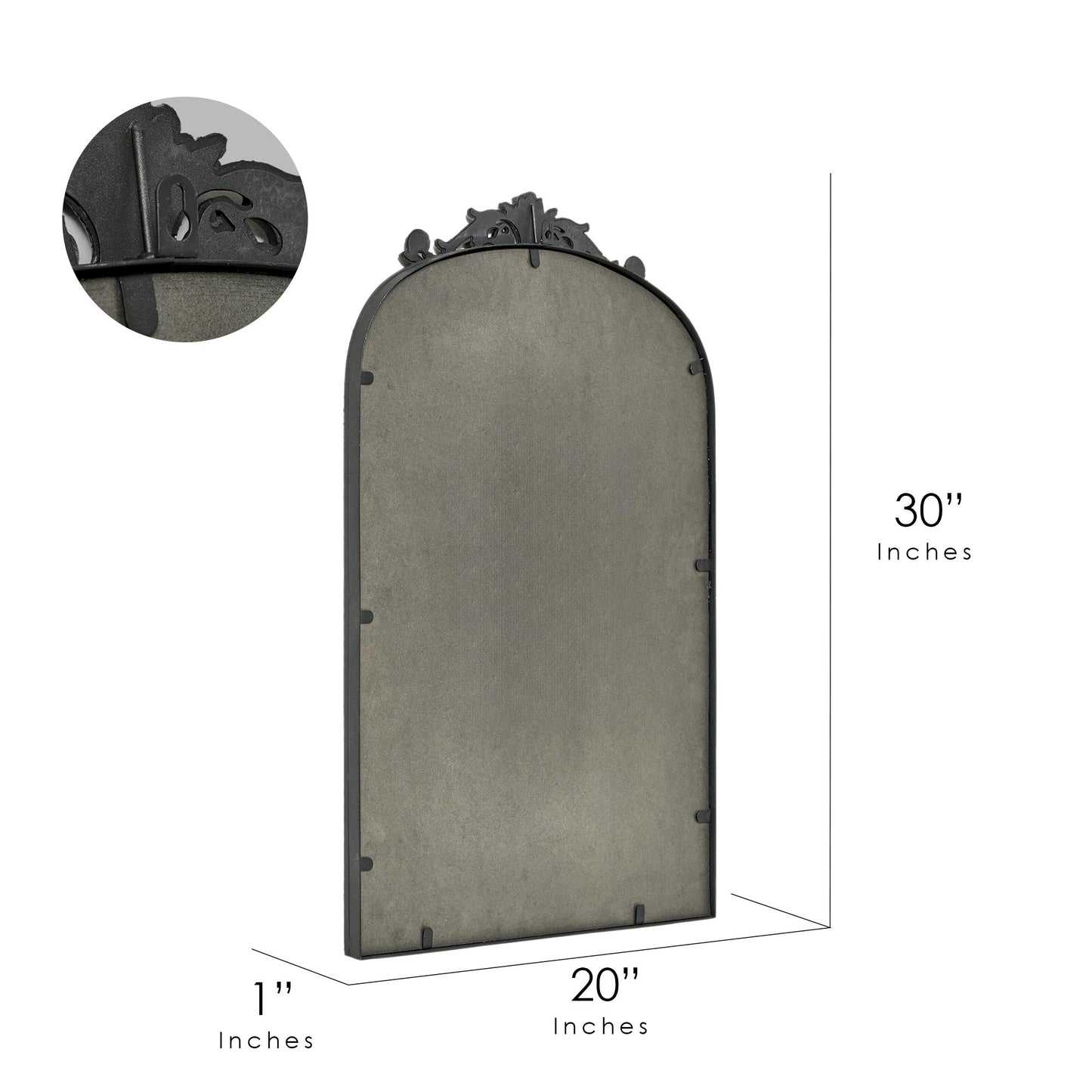 A 20 x 30 pewter arched vanity mirror with antique silver filigree crest and beaded edge, mounted vertically above a compact dresser in a bright neutral room.