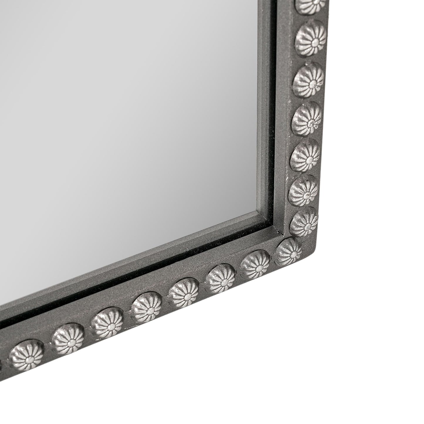 A 22 x 64 pewter arched full length mirror with antique silver scrollwork and beaded frame, positioned as a narrow floor leaner near a closet and entry area.
