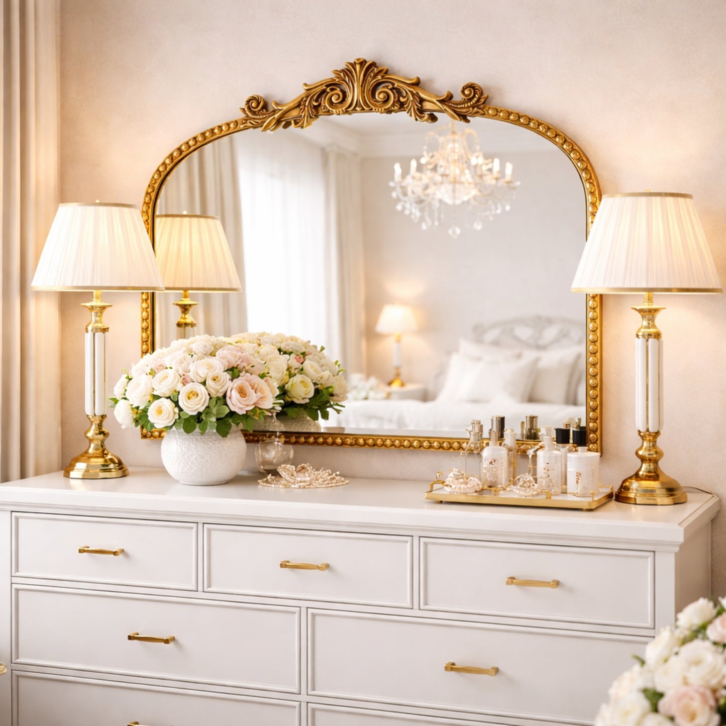 A wide 24 x 34 antique gold arched mirror with ornate filigree crest and beaded frame, styled horizontally above a mantel with candles, florals and warm room decor.