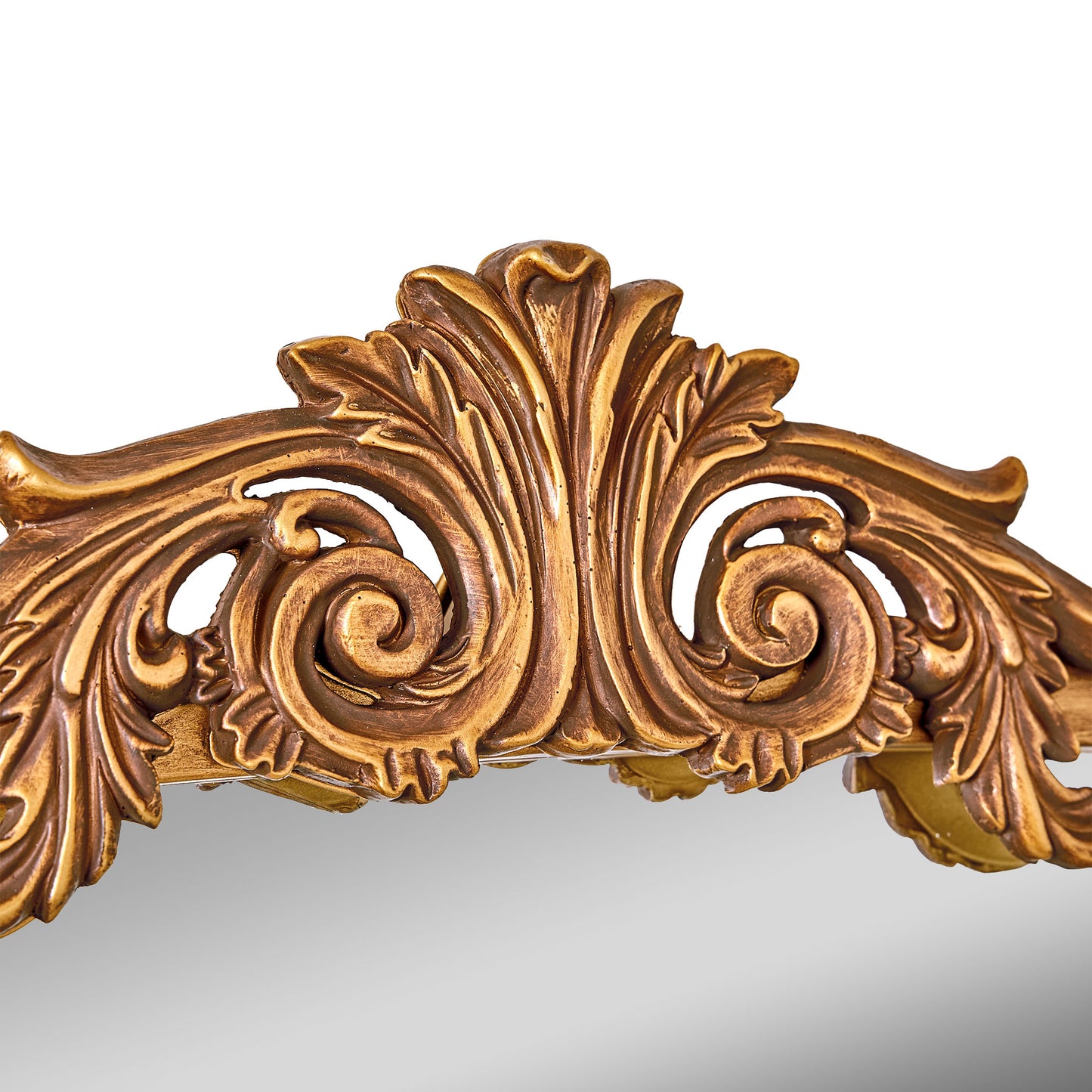A wide 24 x 34 antique gold arched mirror with ornate filigree crest and beaded frame, styled horizontally above a mantel with candles, florals and warm room decor.