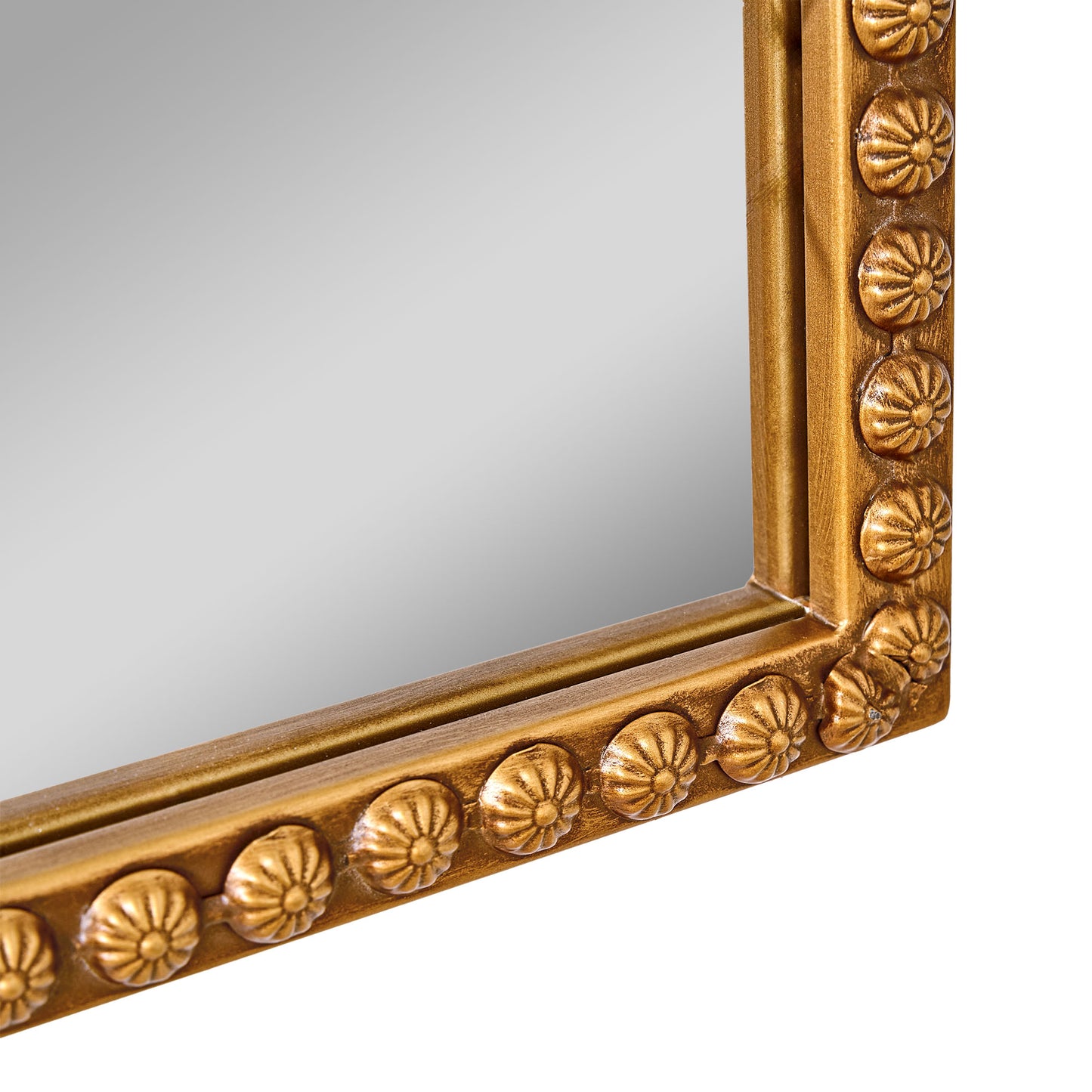 A wide 24 x 34 antique gold arched mirror with ornate filigree crest and beaded frame, styled horizontally above a mantel with candles, florals and warm room decor.