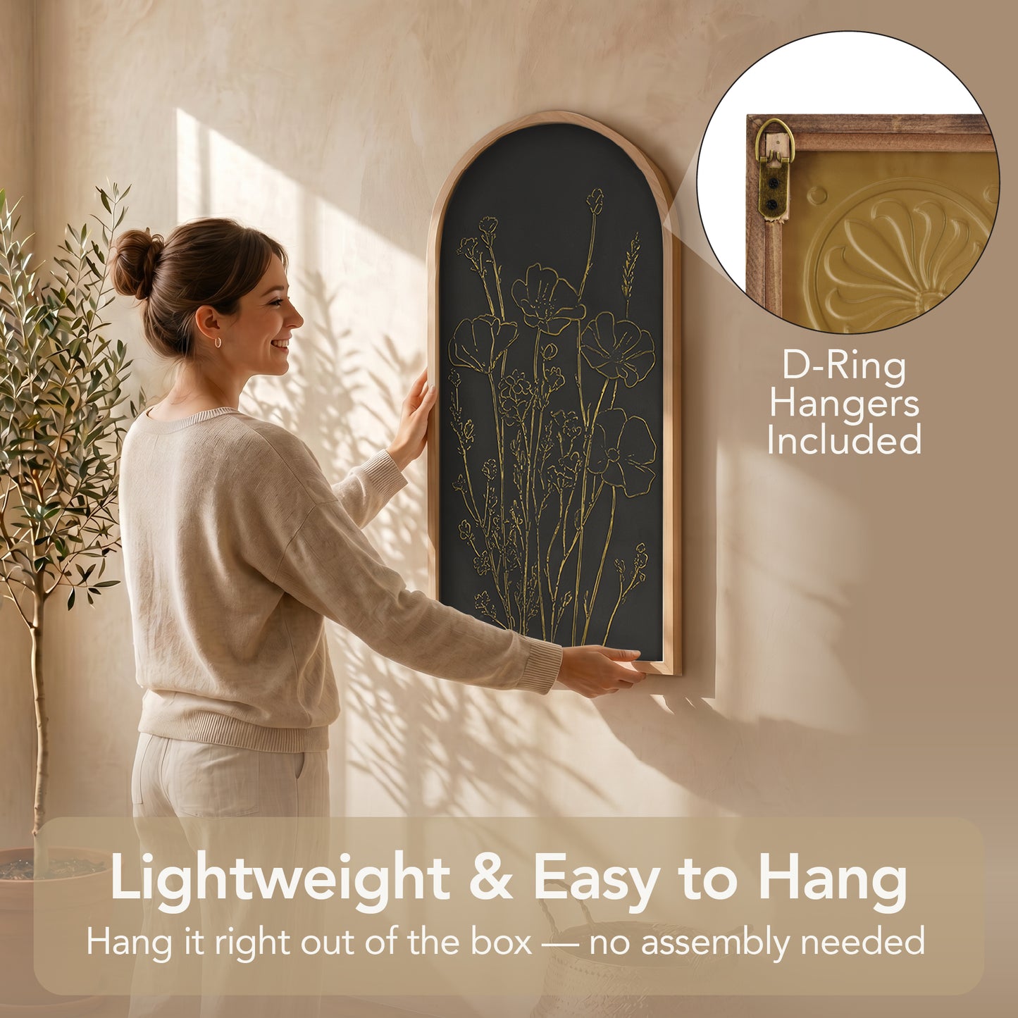 Black and gold embossed floral wall art in an arched frame with 3D metal detailing, styled as neutral boho coastal decor for living room, bedroom, bathroom, or hallway.