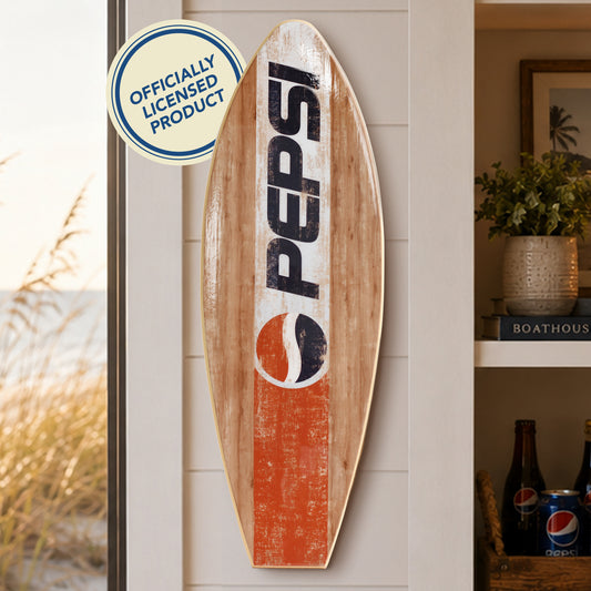 Officially licensed Pepsi surfboard wall plaque featuring vintage distressed graphics on natural wood-look MDF with a coastal beach house style, perfect for bars, man caves, patios, lake houses, and tropical home décor.