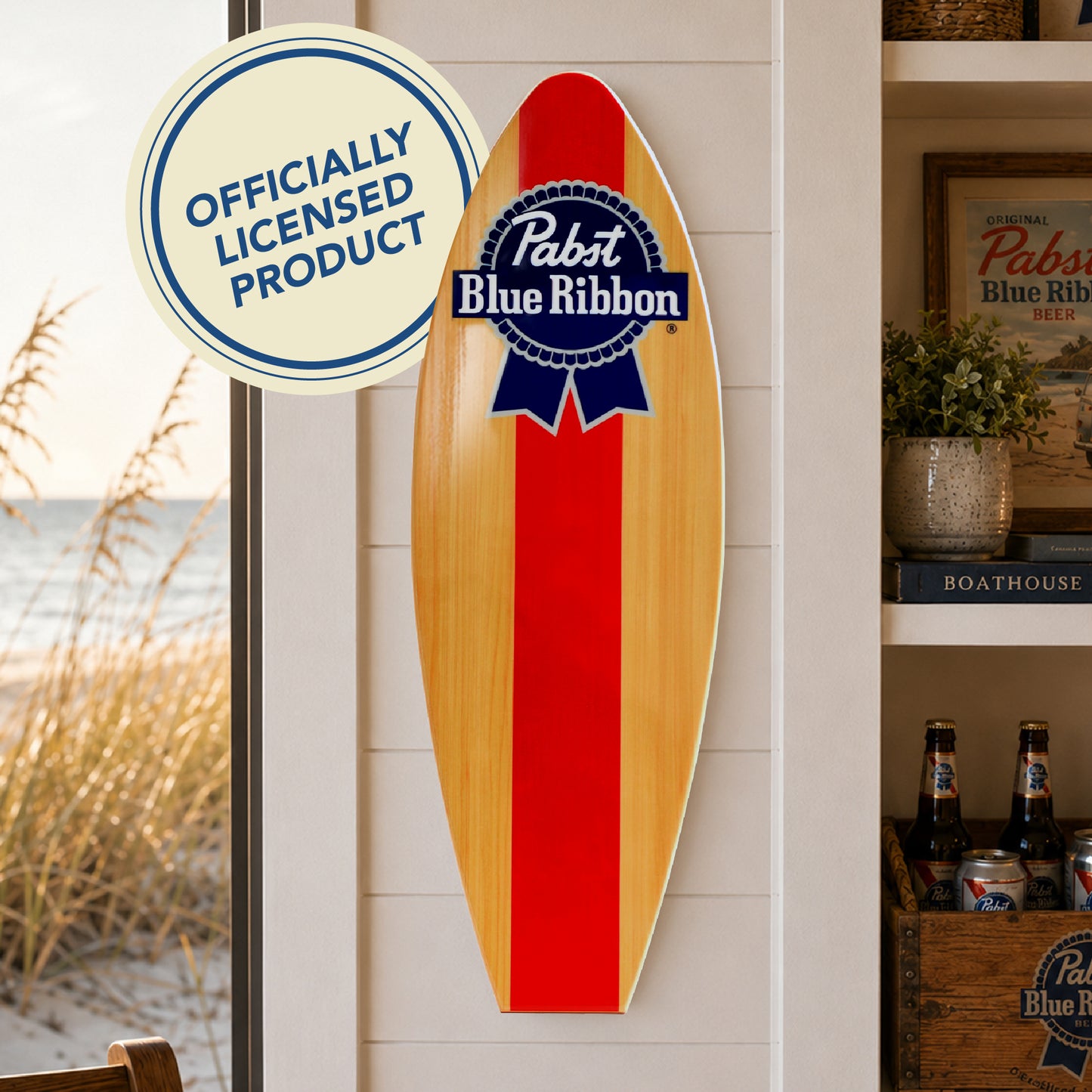 Officially licensed Pabst Blue Ribbon surfboard wall plaque featuring the iconic PBR logo on a natural wood-look MDF surfboard, perfect for home bars, man caves, garages, beach houses, and coastal décor.