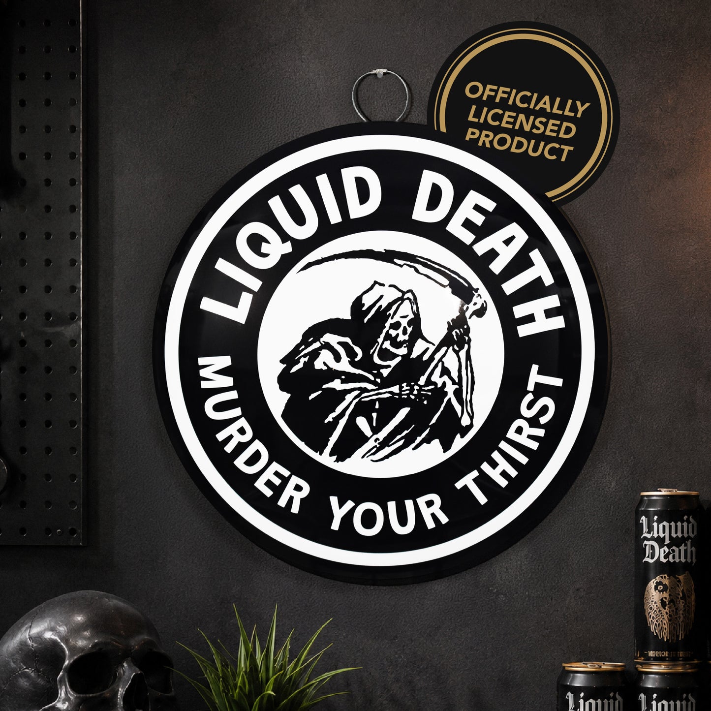 Officially licensed Liquid Death Murder Your Thirst embossed round dome metal wall sign featuring the Grim Reaper logo in black and white with a vintage industrial design.