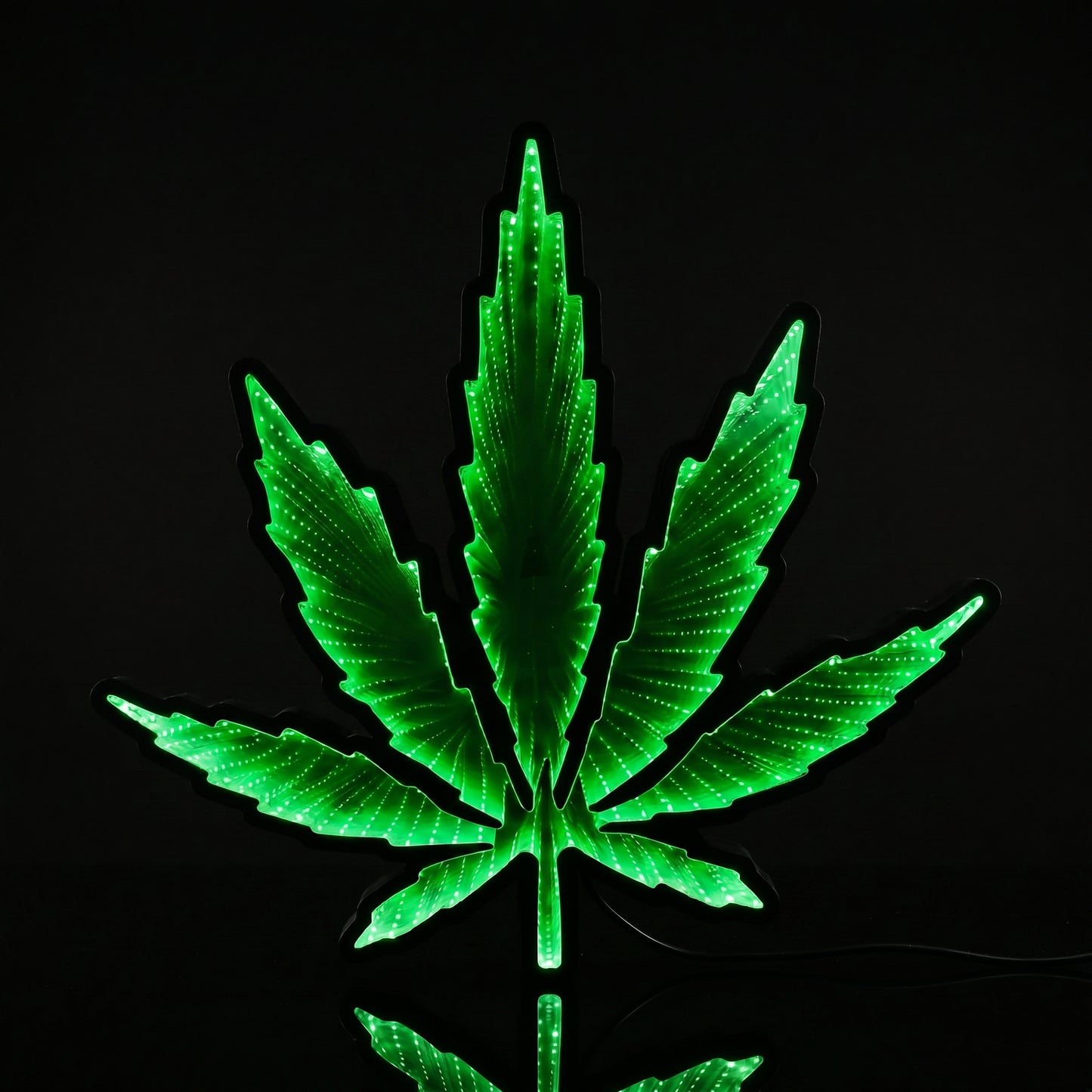 Green Marijuana Leaf Infinity Mirror LED Neon Wall Sign with glowing 3D tunnel lighting effect displayed as modern decor for a smoke lounge, gaming room, bedroom, or dispensary.