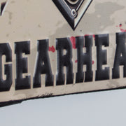 Gearhead Skull Embossed Metal Sign
